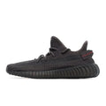 Schwarze Sneaker aus statisch gestricktem Material